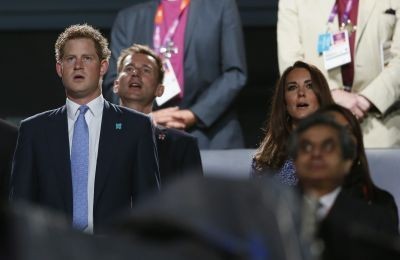 Britain's Prince Harry and Dutchess of Cambridge Kate Middleton sing as they view the closing ceremony of the London 2012 Olympics Stefan Wermuth / Reuters