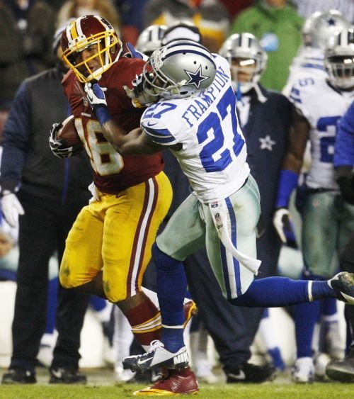 Washington Redskins' Morris fights off Dallas Cowboys' Frampton during their NFL football game in Landover Jonathan Ernst / Reuters