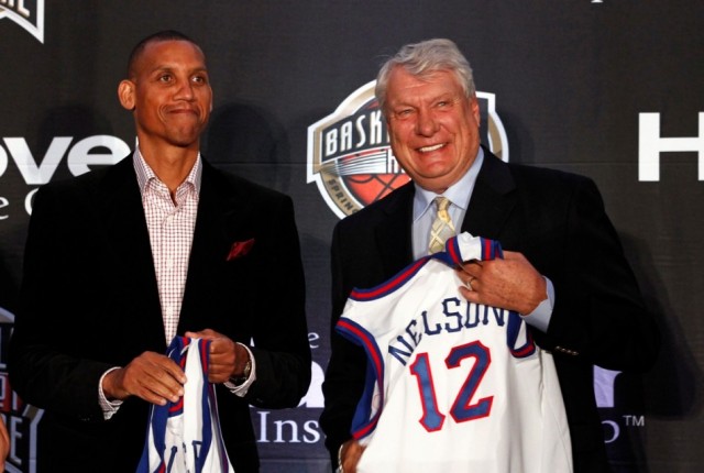 Former NBA star Reggie Miller (L) and NBA coach Don Nelson (R) hold their jerseys as members of the Basketball Hall of Fame class of 2012