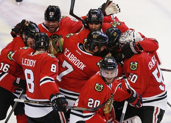 The Chicago Blackhawks celebrate after defeating the Los Angeles Kings