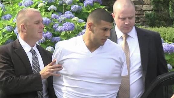Aaron Hernandez arrested and heading to court house for arraignment.