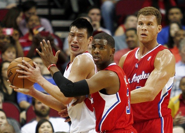 Houston Rockets guard Jeremy Lin reacts as Los Angeles Clippers guard Chris Paul 