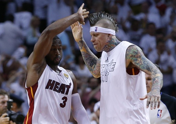 Miami Heat's Dwyane Wade (L) and Chris Andersen