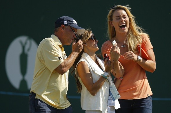 Nadine Moze (C) and skier Lindsey Vonn (R), partners of Fred Couples