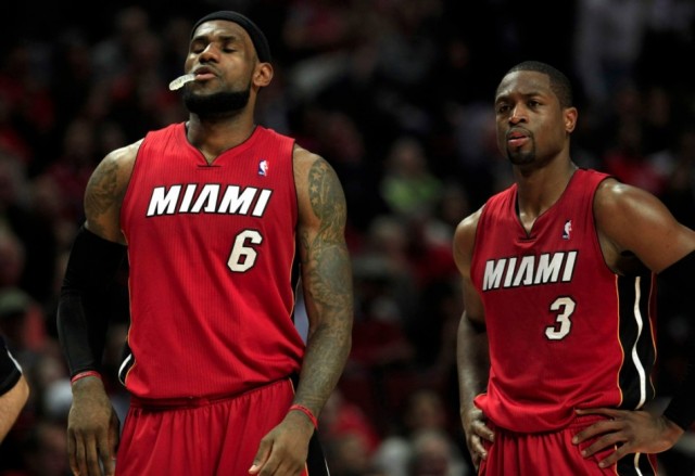 Miami Heat's LeBron James (L) and Dwyane Wade