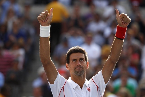 Novak Djokovic of Serbia celebrates after defeating Stanislas Wawrinka