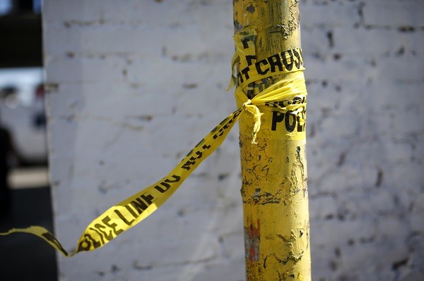 A police line tape is seen at the site of the fatal stabbing of a Los Angeles