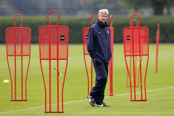 Arsenal manager Arsene Wenger attends