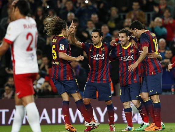 Barcelona's Carles Puyol, Xavi Hernandez, Lionel Messi, Neymar 