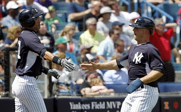 New York Yankees center fielder Brett Gardner (11) and right fielder Ichiro Suzuki 
