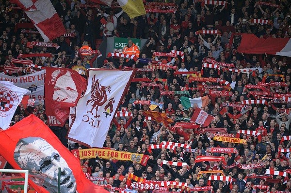 Liverpool fans hold up banners in respect of the Hillsborough