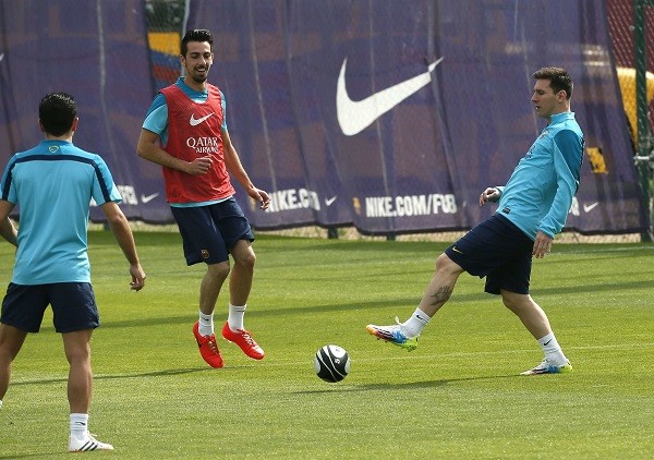 Barcelona's Lionel Messi plays