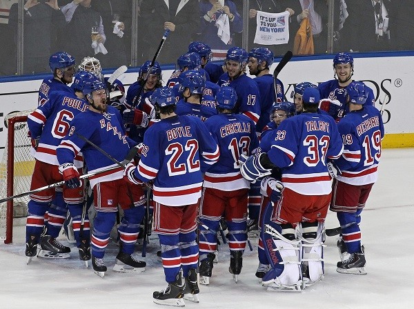  The New York Rangers celebrate defeating the Philadelphia Flyers