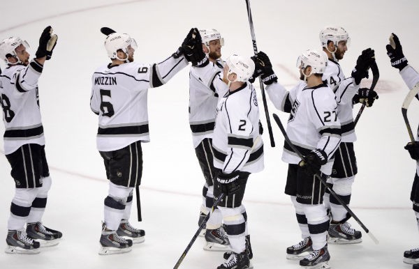 Los Angeles Kings players celebrate after defeating the Anaheim Ducks 
