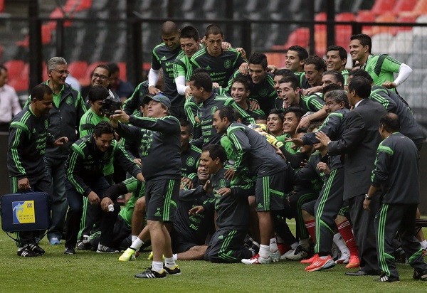 Mexico's striker Javier Hernandez, defender Paul Aguilar