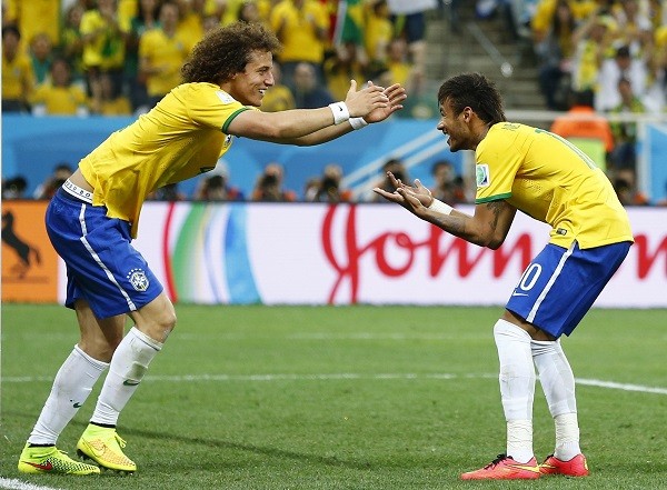 Brazil's David Luiz (L) and Brazil's Neymar 
