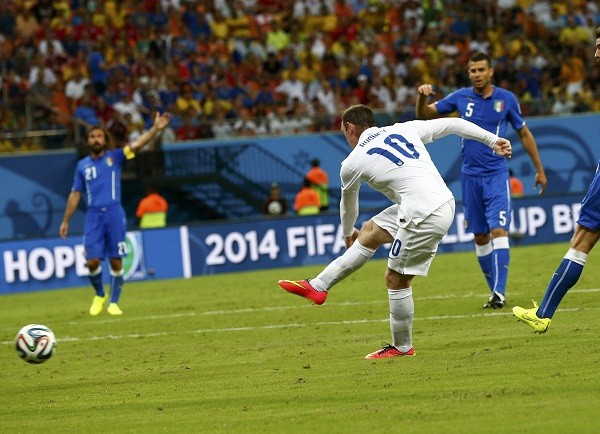 England's Wayne Rooney kicks the ball during their 2014 World Cup