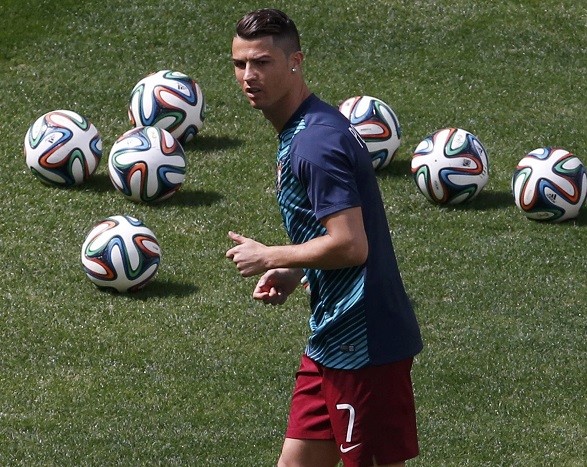 Portugal's Cristiano Ronaldo warms