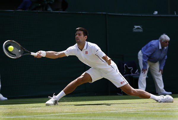 Novak Djokovic of Serbia stretches