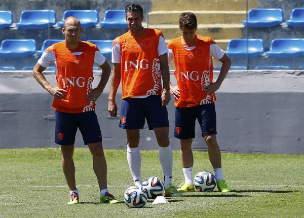 Netherlands' Arjen Robben, Robin Van Persie and Paul Verhaegha