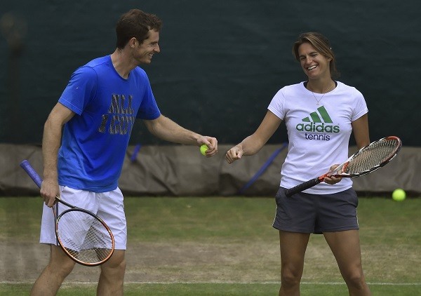 Andy Murray of Britain (L) shares a moment with his coach Amelie Mauresmo