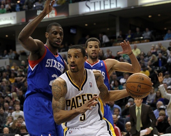 Philadelphia 76ers forward Thaddeus Young (21) and guard Michael Carter-William