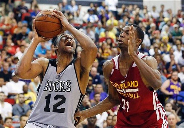 Milwaukee Bucks forward Jabari Parker matches up with Cleveland Cavaliers guard Andrew Wiggins