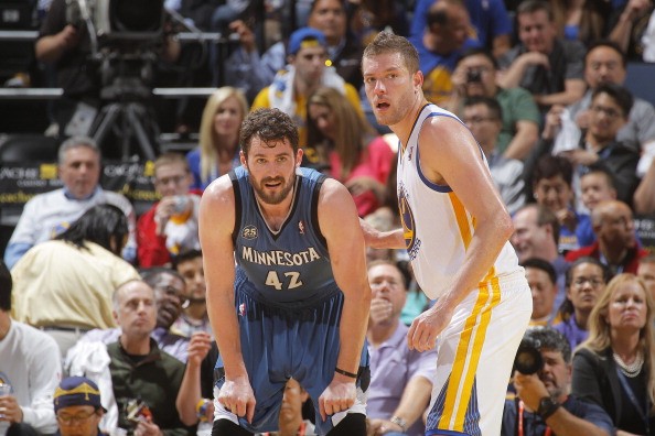 Kevin Love #42 (left) of the Minnesota Timberwolves