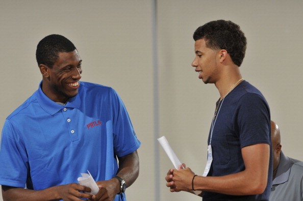 Michael Carter-Williams #1 and Thaddeus Young #21 of the Philadelphia 76ers