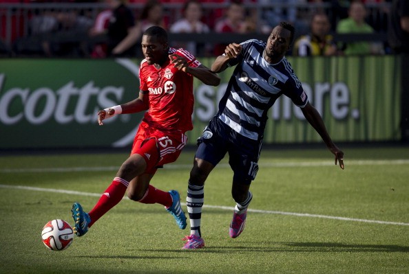 Doneil Henry steals the ball from Sporting's C.J Sapong