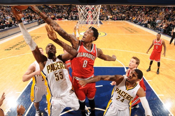 Roy Hibbert #55 of the Indiana Pacers and Larry Sanders #8 