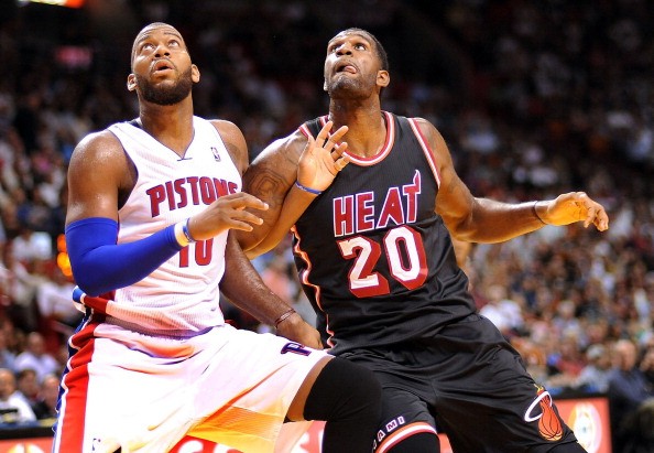 Miami Heat's Greg Oden and Detroit Pistons' Greg Monroe