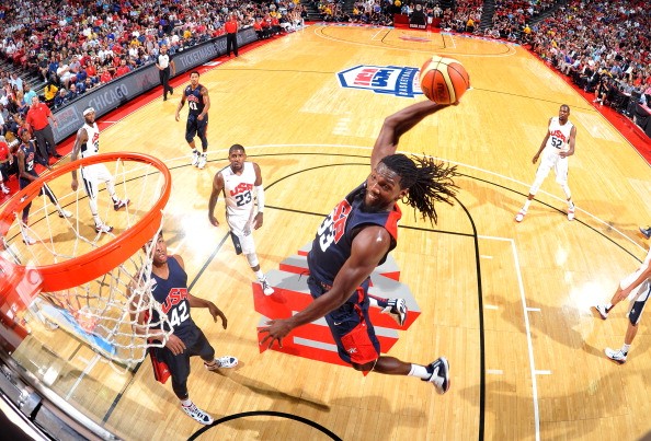 Kenneth Faried #33 goes up for the slam dunk during the USA