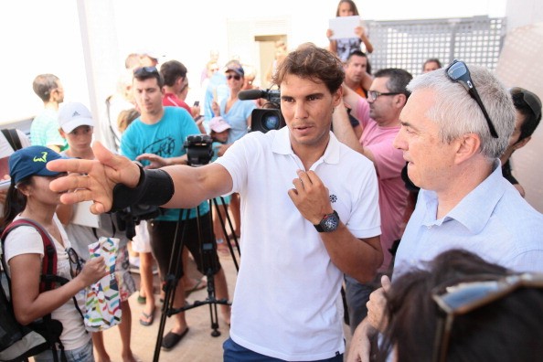 Rafa Nadal (C) attends the opening of 'Centre Tenis & Padel'