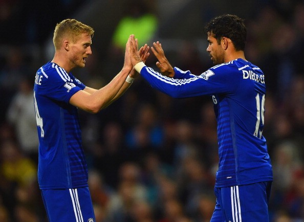 Andre Schurrle of Chelsea congratulates Diego Costa