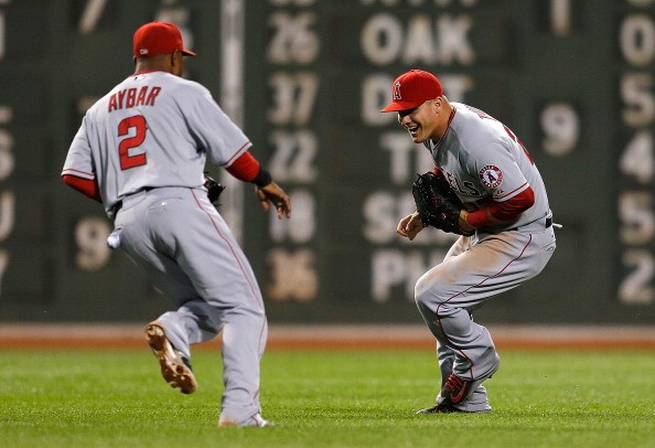Erick Aybar #2 and Mike Trout #27 of the Los Angeles