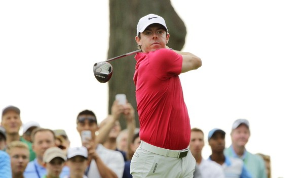 Rory McIlroy of Northern Ireland plays his shot from the