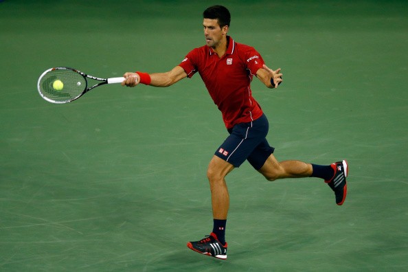Novak Djokovic of Serbia returns a shot against Diego Schwartzman 