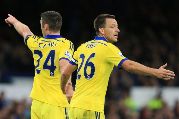 Gary Cahill of Chelsea (L) and teammate John Terry 