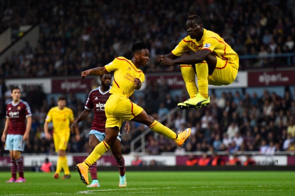  Raheem Sterling of Liverpool scores is team's first goal as teammate Mario Balotelli