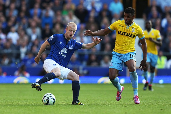 Steven Naismith of Everton is challenged 