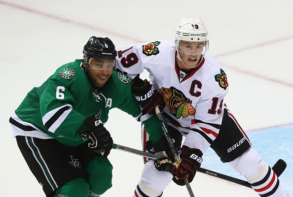 Trevor Daley #6 of the Dallas Stars and Jonathan Toews #19 of the Chicago Blackhawks