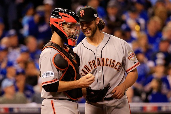 Madison Bumgarner #40 and Buster Posey #28 of the San Francisco Giants