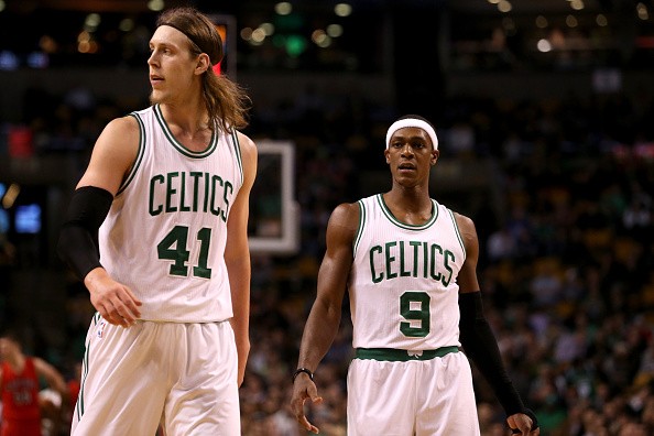 Kelly Olynyk #41 and Rajon Rondo #9 of the Boston Celtics
