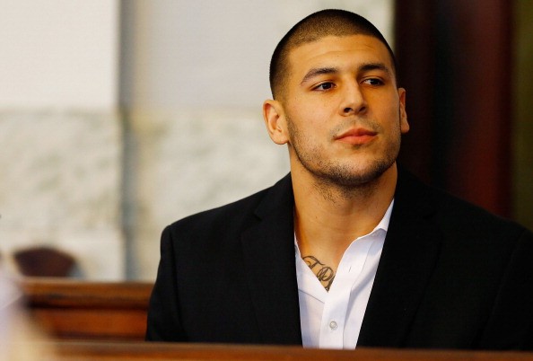 Aaron Hernandez sits in the courtroom of the Attleboro District Court