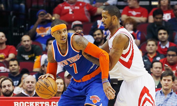 Trevor Ariza #1 of the Houston Rockets defends against Carmelo Anthony #7 of the New York Knicks