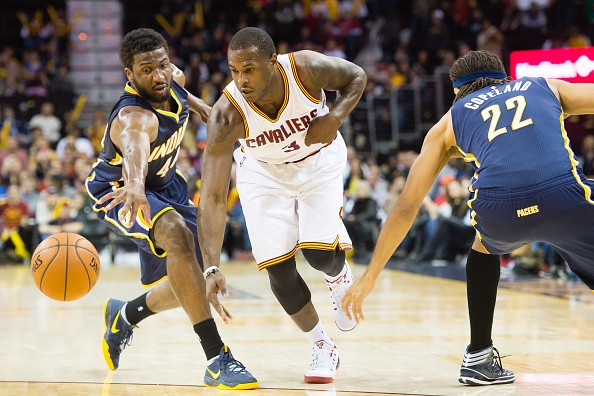 Solomon Hill #44 and Chris Copeland #22 of the Indiana Pacers fight for a loose ball with Dion Waiters #3 