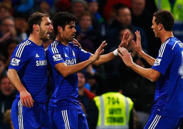 Diego Costa of Chelsea (C) celebrates with team mates Branislav Ivanovic 