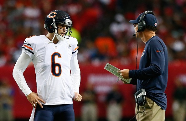 Head coach Marc Trestman converses with Jay Cutler #6 of the Chicago Bears 