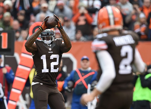 Josh Gordon #12 makes a catch on a ball thrown by Johnny Manziel #2 of the Cleveland Browns 